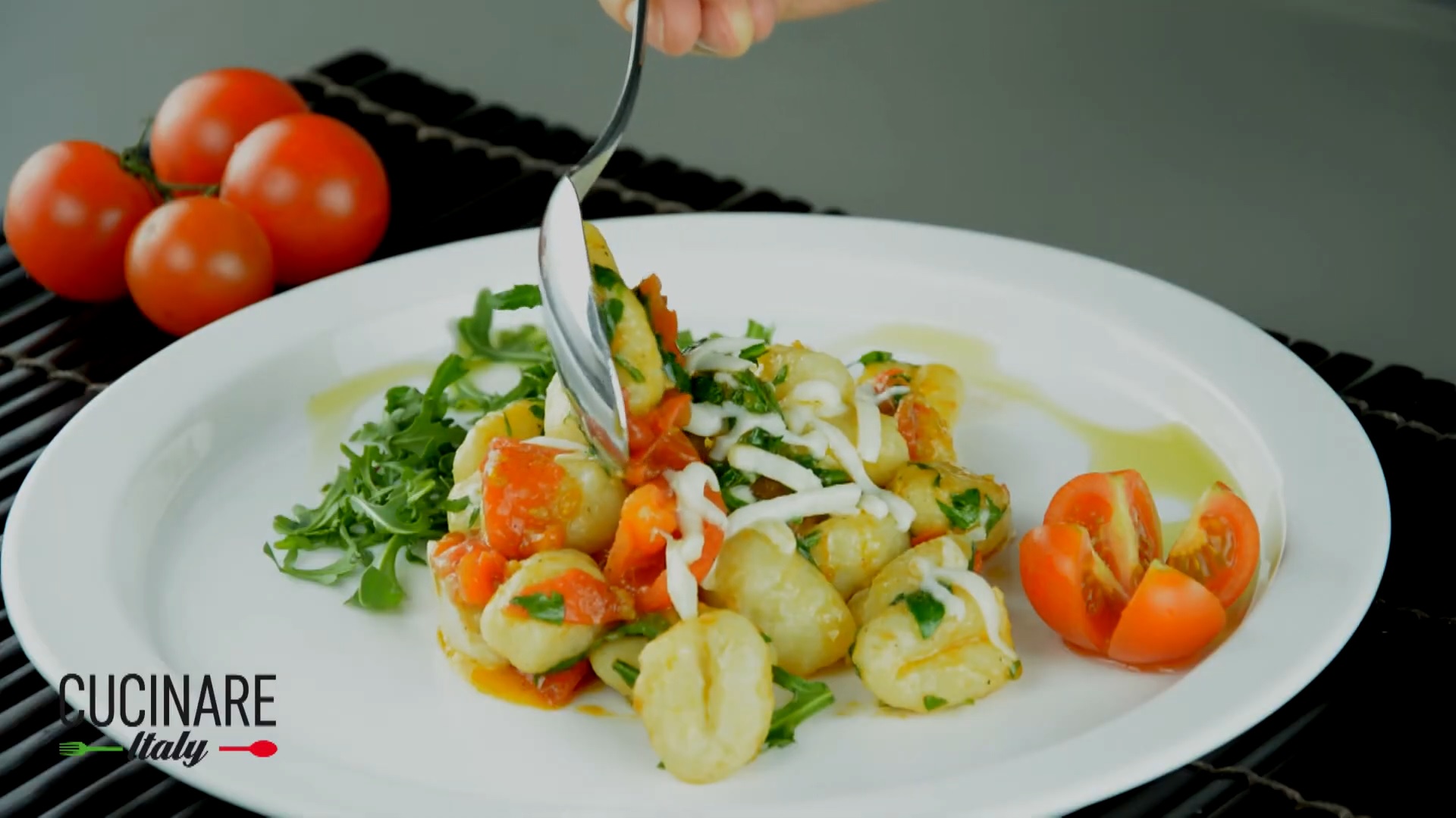 Patato Gnocchi with cherry tomatoes and arugula