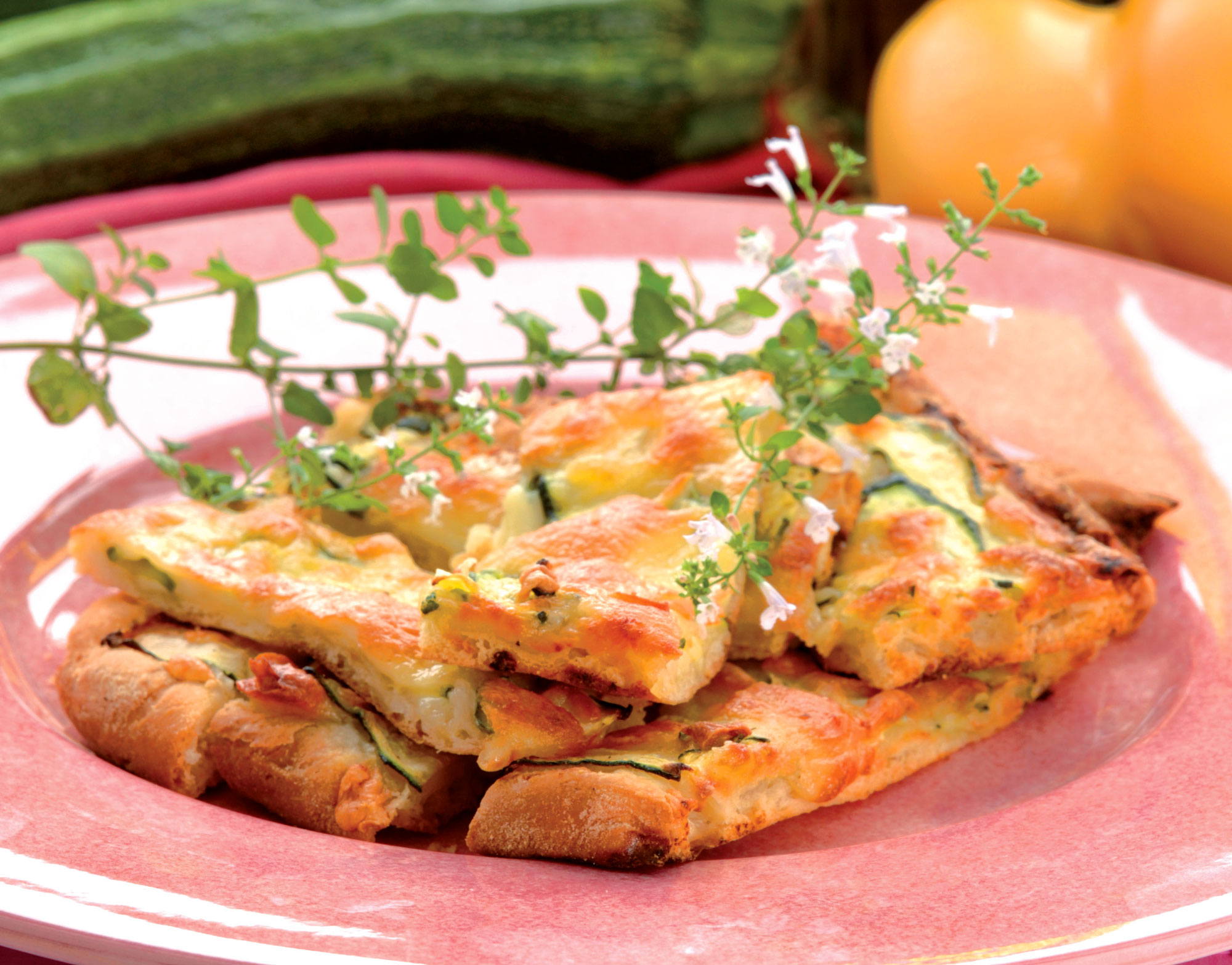 Pizza covered with provola and zucchini